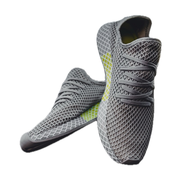 A pair of grey mesh sneakers on pure white, exported with Sweepcut's Amazon main image preset at 1600 by 1600