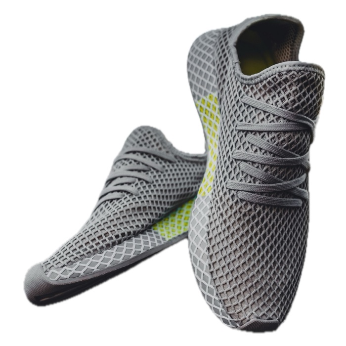 A pair of grey mesh sneakers cut out on white, exported with Sweepcut's eBay preset at 1600 by 1600